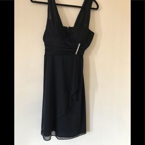 Black short dress -sleeveless.